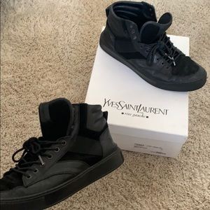 Black mid/high top YSL men’s sneaker.
